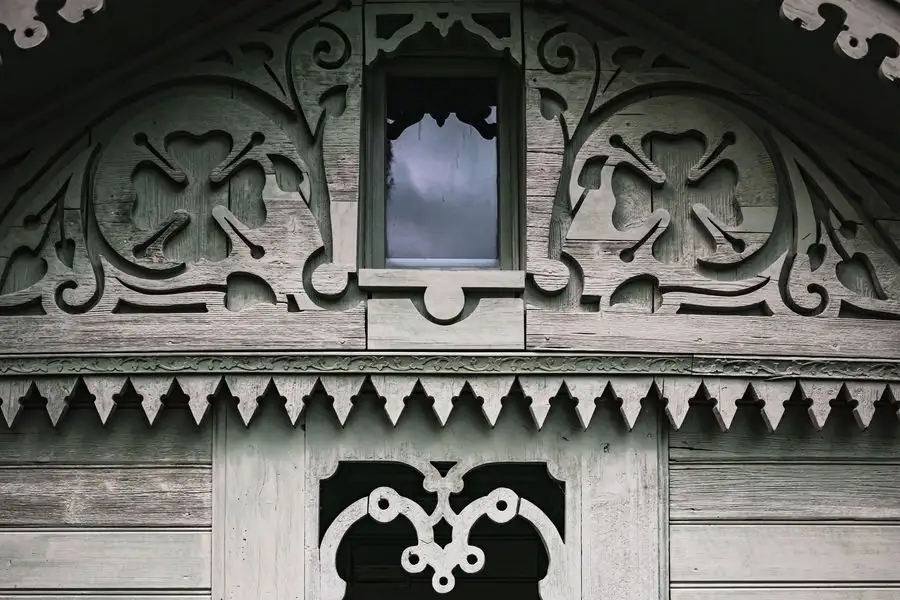 Carved timber facade detail on an old house